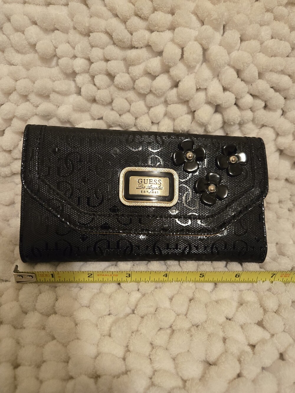 GUESS Black Patent Floral Accent Clutch Wallet with Gold Plaque